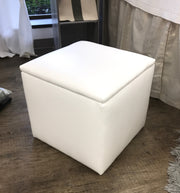 storage ottoman, white faux leather, soft to touch, solid construction, holds up to 220 lbs.